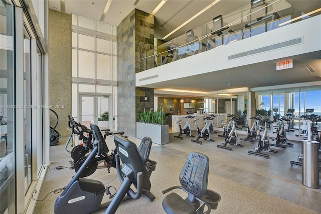 18201 Collins Ave Unit 808, Sunny Isles Beach, FL 33160 - exercise room with a towering ceiling and french doors