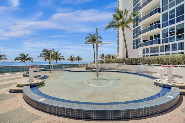 18201 Collins Ave Unit 808, Sunny Isles Beach, FL 33160 - view of swimming pool featuring a water view