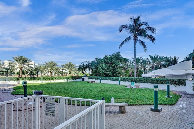18201 Collins Ave Unit 808, Sunny Isles Beach, FL 33160 - view of grassy yard with a patio area