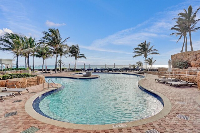 18201 Collins Ave Unit 808, Sunny Isles Beach, FL 33160 - community pool with a patio area