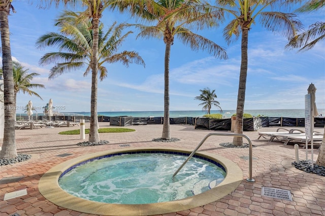 18201 Collins Ave Unit 808, Sunny Isles Beach, FL 33160 - view of pool with a community hot tub, a water view, and a patio area