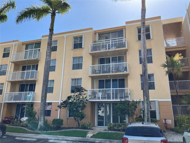 1450 SE 3rd Ave Unit 208, Dania Beach, FL 33004 - view of apartment building / complex