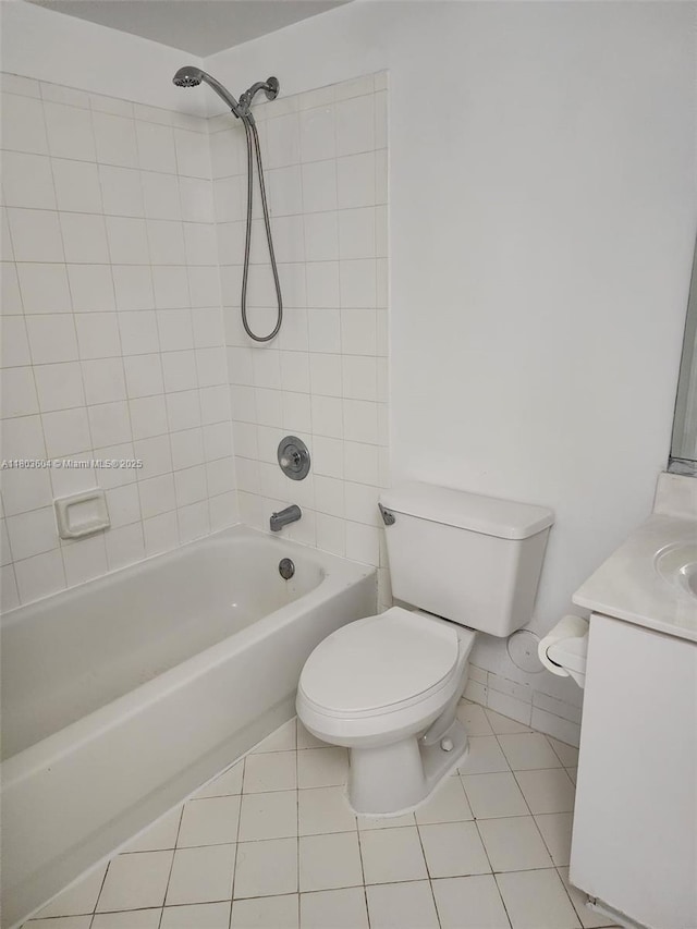 1450 SE 3rd Ave Unit 208, Dania Beach, FL 33004 - full bathroom with toilet, tile patterned flooring, vanity, and tub / shower combination