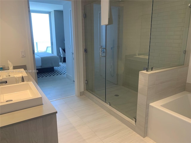 4010 S Ocean Dr Unit R3407, Hollywood, FL 33019 - full bath featuring a shower stall, double vanity, a bath, and connected bathroom