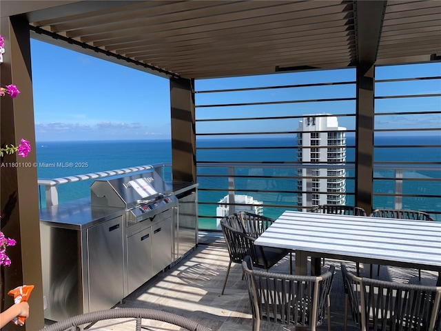 4010 S Ocean Dr Unit R3407, Hollywood, FL 33019 - balcony featuring outdoor dining area, exterior kitchen, a water view, and area for grilling