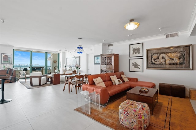 3400 SW 27th Ave Unit 1102, Miami, FL 33133 - living room with crown molding and floor to ceiling windows
