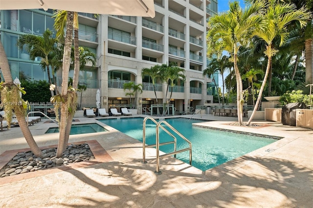 3400 SW 27th Ave Unit 1102, Miami, FL 33133 - community pool featuring a patio area