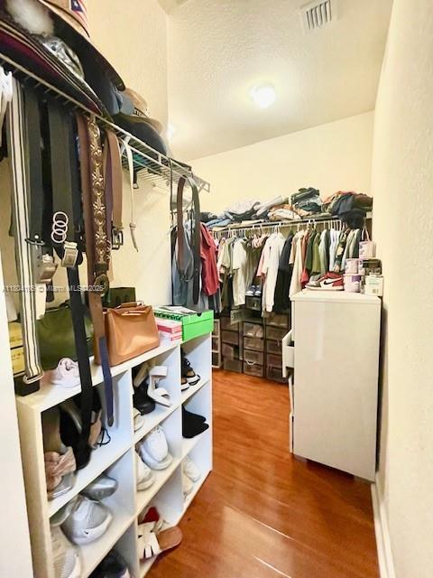 380 NE 37th Ter, Homestead, FL 33033 - walk in closet with wood finished floors