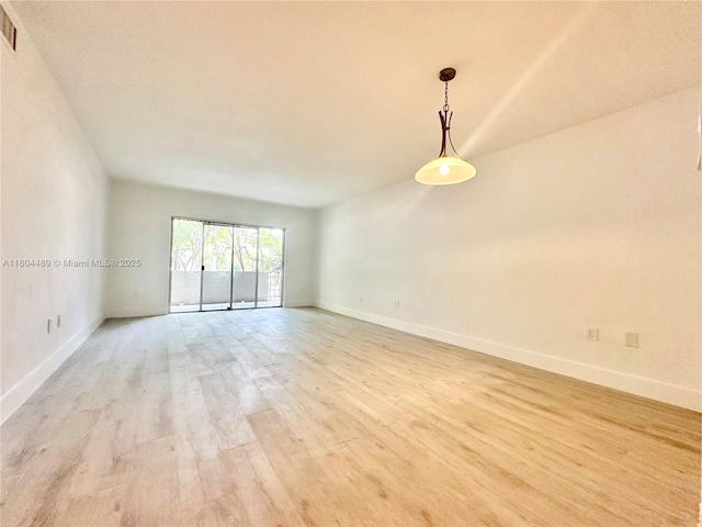 6890 N Kendall Dr Unit B204, Pinecrest, FL 33156 - spare room with light wood-style flooring and baseboards