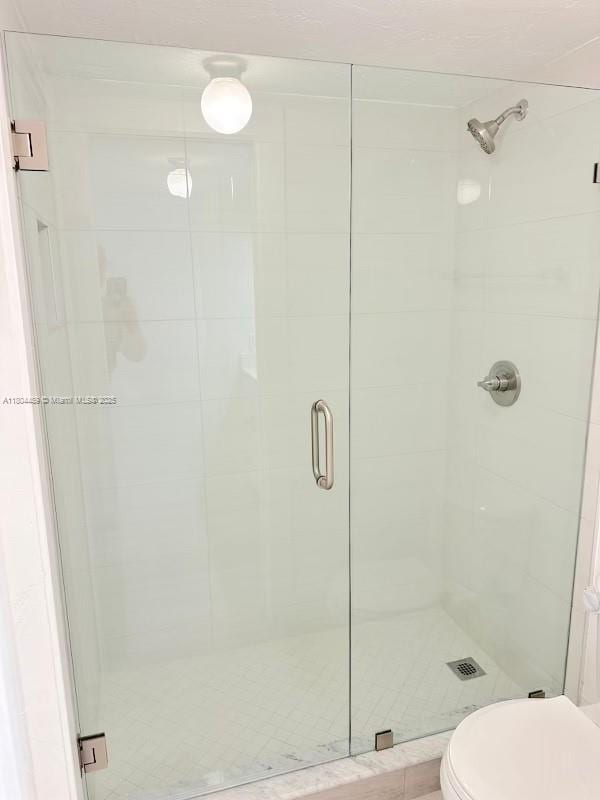 6890 N Kendall Dr Unit B204, Pinecrest, FL 33156 - bathroom with a shower stall and toilet