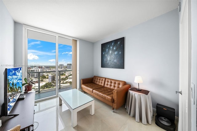 1900 N Bayshore Dr Unit 2512, Miami, FL 33132 - living area with a wall of windows, light tile patterned flooring, and a view of city