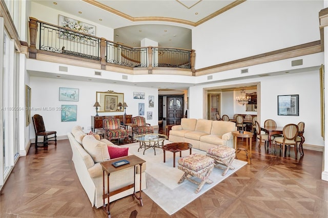 6051 N Ocean Dr Unit Ph5, Hollywood, FL 33019 - living area with a high ceiling, baseboards, and a chandelier