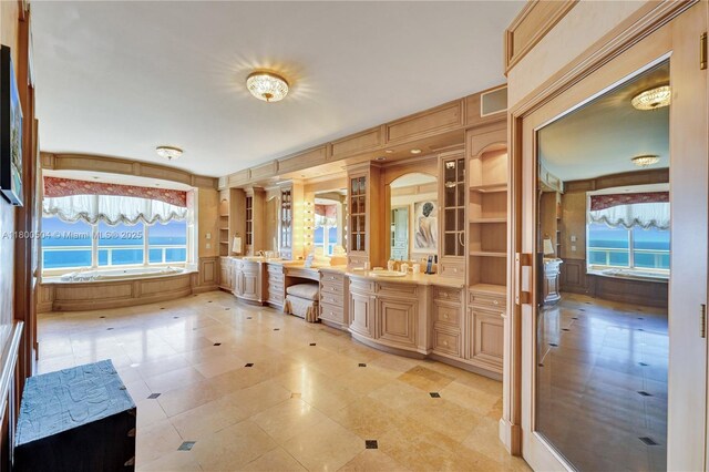 6051 N Ocean Dr Unit Ph5, Hollywood, FL 33019 - full bath featuring double vanity, a garden tub, and a decorative wall