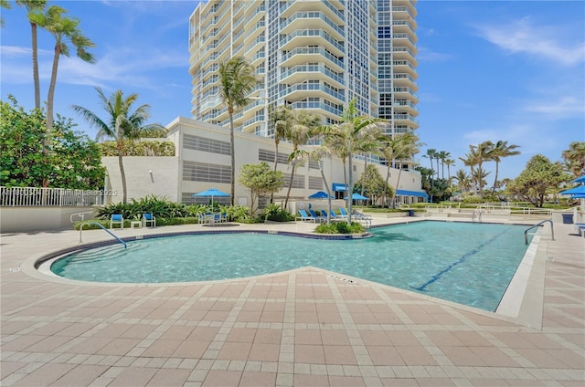 6051 N Ocean Dr Unit Ph5, Hollywood, FL 33019 - community pool with a patio and fence