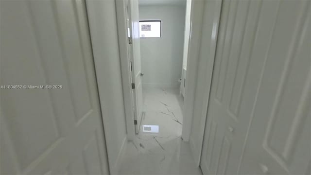3004 SW 4th St, Lehigh Acres, FL 33976 - hall with light marble finish floors