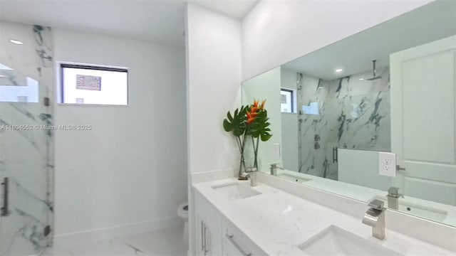 3004 SW 4th St, Lehigh Acres, FL 33976 - bathroom with a marble finish shower, healthy amount of natural light, toilet, and marble finish floors