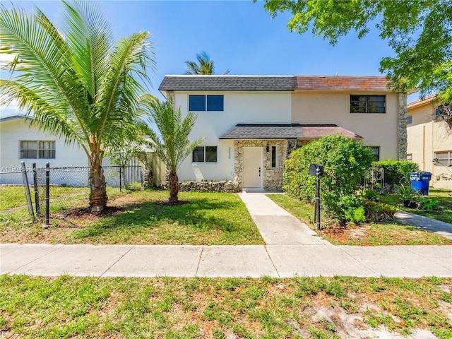 2039 NE 172nd St, North Miami Beach, FL 33162 - multi unit property with stucco siding, stone siding, and roof with shingles