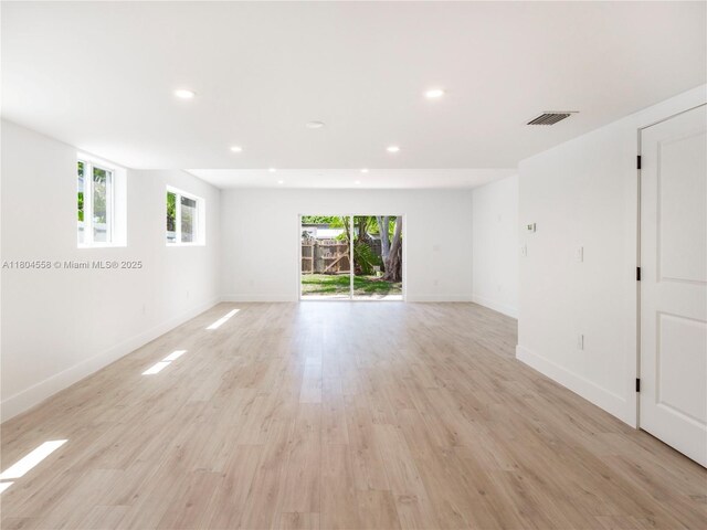 2039 NE 172nd St, North Miami Beach, FL 33162 - empty room with recessed lighting, light wood finished floors, and baseboards