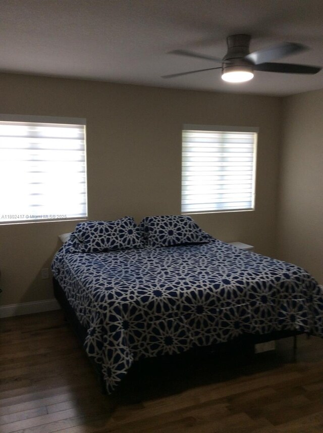 21046 SW 133rd Ct, Miami, FL 33177 - bedroom with wood finished floors, a ceiling fan, and baseboards