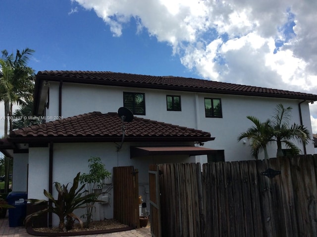 21046 SW 133rd Ct, Miami, FL 33177 - back of property with a tiled roof and stucco siding