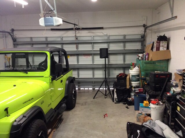 21046 SW 133rd Ct, Miami, FL 33177 - garage featuring a garage door opener