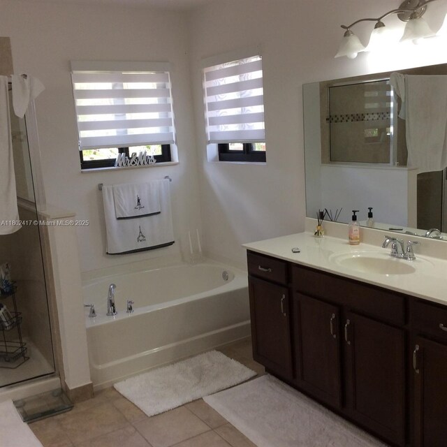21046 SW 133rd Ct, Miami, FL 33177 - bathroom featuring tile patterned flooring, a bath, vanity, and a shower stall