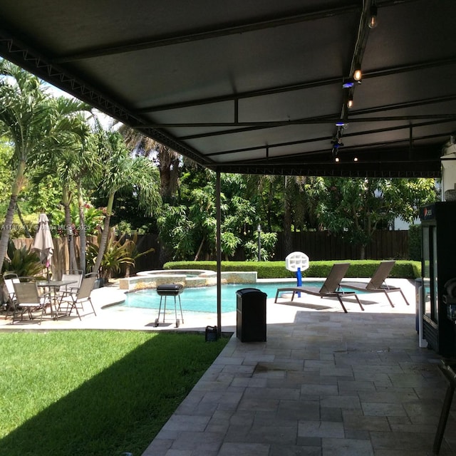 21046 SW 133rd Ct, Miami, FL 33177 - view of swimming pool featuring a patio and a pool with connected hot tub