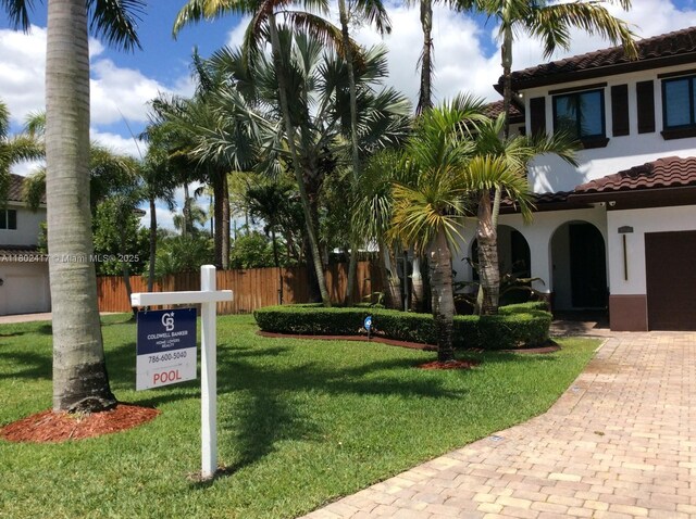 21046 SW 133rd Ct, Miami, FL 33177 - surrounding community with decorative driveway