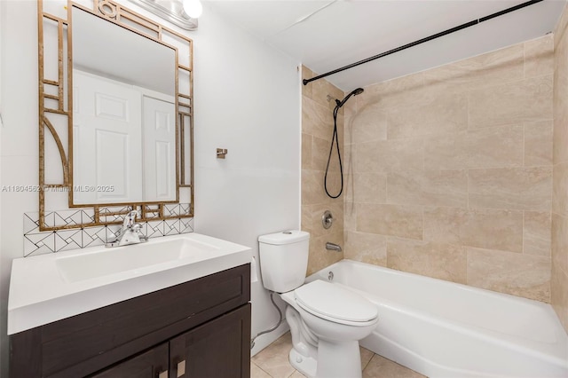 bathroom with toilet, tile patterned flooring, vanity, and shower / washtub combination