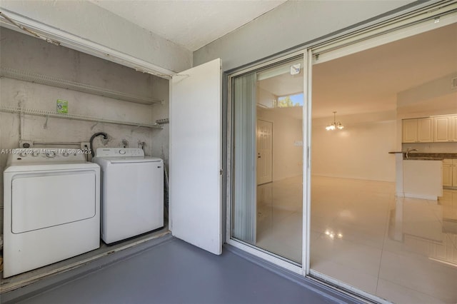 clothes washing area featuring washing machine and dryer