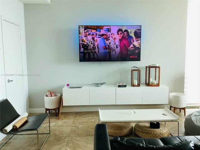 9066 SW 73rd Ct Unit 2401, Miami, FL 33156 - living area featuring baseboards
