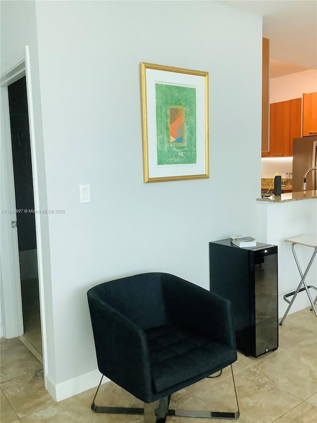 9066 SW 73rd Ct Unit 2401, Miami, FL 33156 - sitting room with baseboards