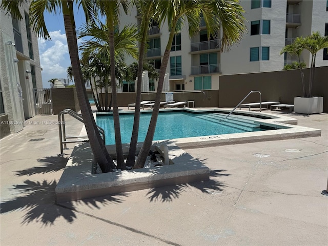 9066 SW 73rd Ct Unit 2401, Miami, FL 33156 - community pool featuring a patio