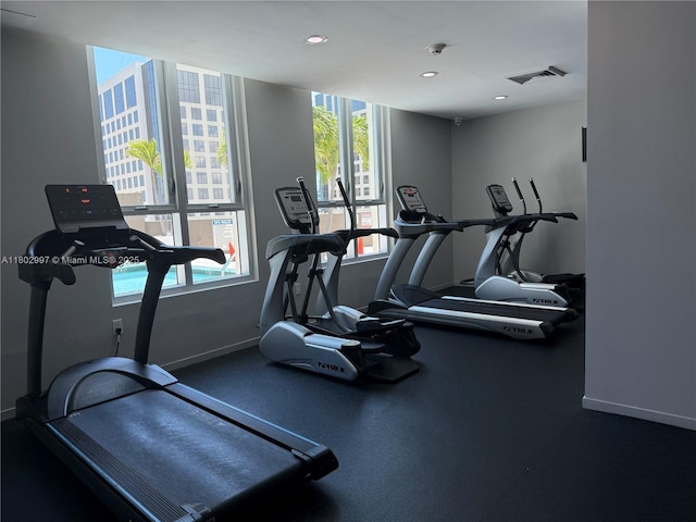 9066 SW 73rd Ct Unit 2401, Miami, FL 33156 - gym with baseboards, plenty of natural light, and recessed lighting