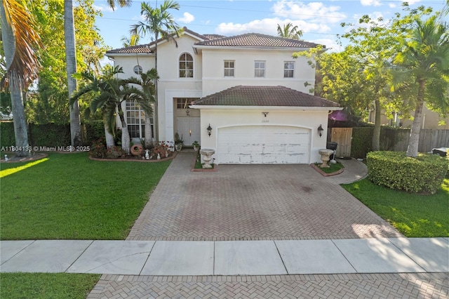 15120 SW 156th Ave, Miami, FL 33196 - mediterranean / spanish-style house with decorative driveway, stucco siding, and a tile roof