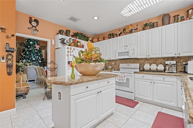 15120 SW 156th Ave, Miami, FL 33196 - kitchen featuring white appliances, light tile patterned flooring, tasteful backsplash, and recessed lighting