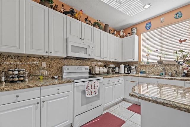 15120 SW 156th Ave, Miami, FL 33196 - kitchen featuring white appliances, a sink, and white cabinets