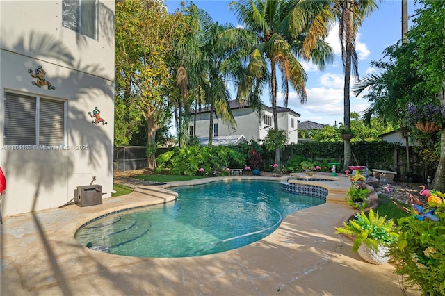 15120 SW 156th Ave, Miami, FL 33196 - view of swimming pool with a fenced backyard, a patio area, and a pool with connected hot tub