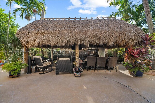 15120 SW 156th Ave, Miami, FL 33196 - view of patio with outdoor dining space and a gazebo