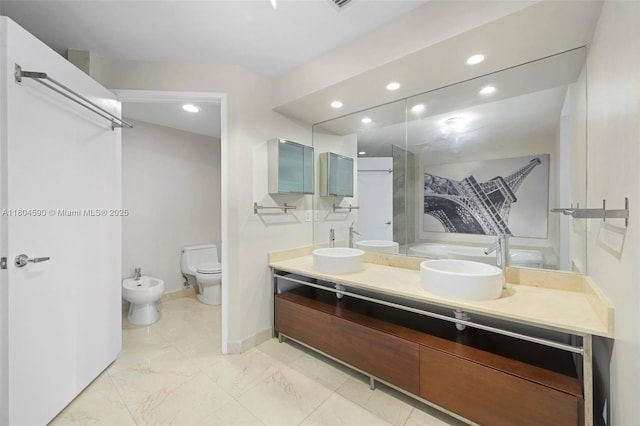 16275 Collins Ave Unit 1202, Sunny Isles Beach, FL 33160 - full bathroom featuring a bidet, recessed lighting, toilet, double vanity, and a shower stall