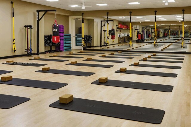 6670 NW 27th Ave, Boca Raton, FL 33496 - exercise room with wood finished floors