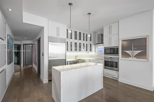 2020 N Bayshore Dr Unit 2001, Miami, FL 33137 - kitchen with black appliances, wall chimney exhaust hood, a sink, white cabinetry, and recessed lighting