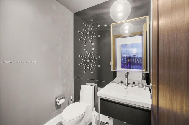 2020 N Bayshore Dr Unit 2001, Miami, FL 33137 - half bath with toilet, vanity, and baseboards