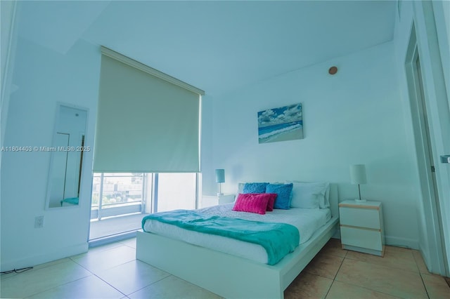 90 SW 3rd St Unit 1401, Miami, FL 33130 - bedroom featuring tile patterned floors and baseboards