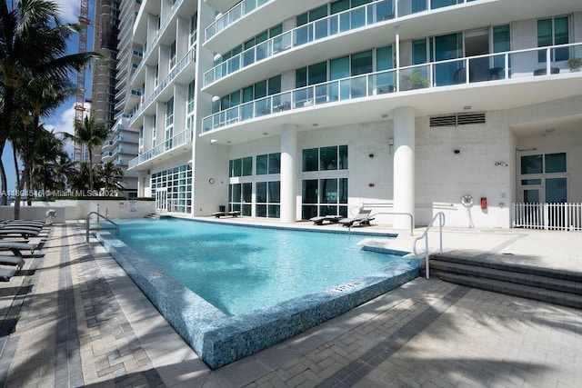 665 NE 25th St Unit 405, Miami, FL 33137 - community pool featuring a patio