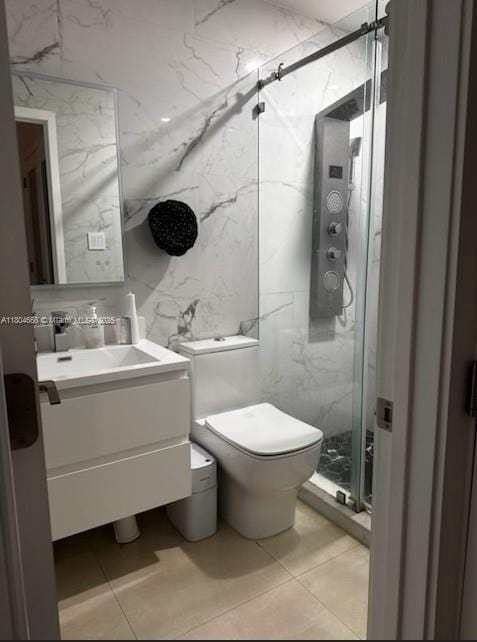 6950 NW 168th St, Hialeah, FL 33015 - full bath featuring a marble finish shower, vanity, tile patterned flooring, tile walls, and toilet