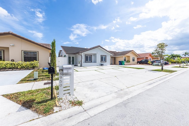 6950 NW 168th St, Hialeah, FL 33015 - single story home featuring stucco siding and a residential view
