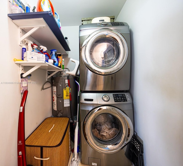 6950 NW 168th St, Hialeah, FL 33015 - laundry room featuring stacked washer and clothes dryer and water heater
