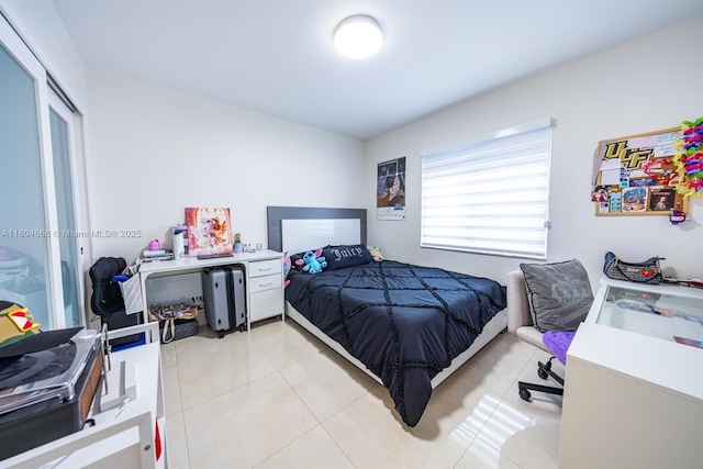 6950 NW 168th St, Hialeah, FL 33015 - bedroom with light tile patterned flooring