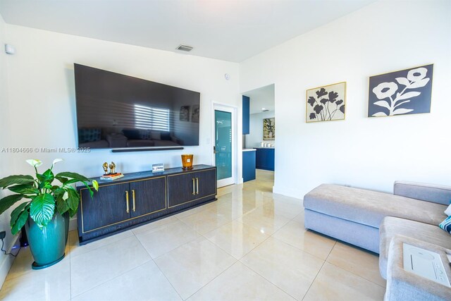 6950 NW 168th St, Hialeah, FL 33015 - living room featuring light tile patterned floors